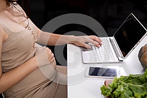 Pregnant women are using laptops for internet use. Find medical information for children who are about to be
