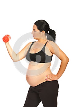 Pregnant workout with dumbbell