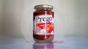 Prego Traditional Tomato Pasta Sauce jar bottle on a table with natural light