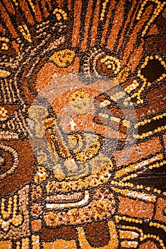 Prehispanic mosaic from seeds and grains photo