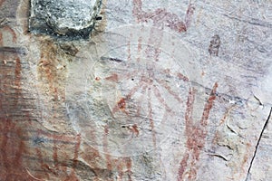 cave paintings of faical in san ignacio cajamarca peru with hunters and warriors used boleadora stones with antiquity photo