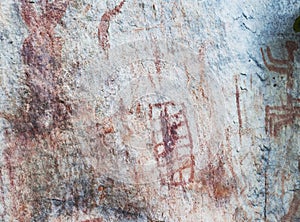 cave paintings of faical in san ignacio cajamarca peru with hunters and warriors used boleadora stones with antiquity photo