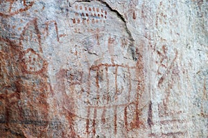 cave paintings of faical in san ignacio cajamarca peru with hunters and warriors used boleadora stones with antiquity photo