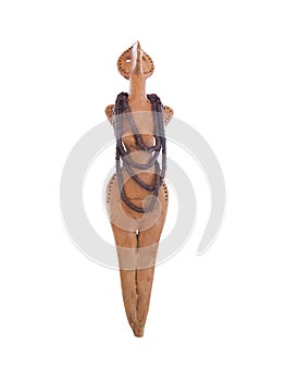 Prehistoric clay figurine of a woman isolated