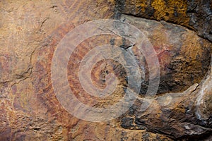 Prehistoric paintings on rock known as petroglyphs in Colombia
