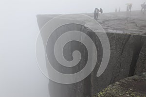 Preikestolen rock taken in deep fog, Norway fjord