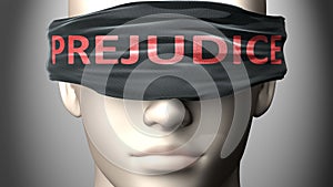 Prejudice can make things harder to see or makes us blind to the reality - pictured as word Prejudice on a blindfold to symbolize