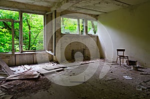 Premises of abandoned school in resettled village of Pogonnoye in exclusion zone of Chernobyl nuclear power plant