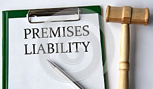 PREMISES LIABILITY - words on a white sheet on a white background and a judge\'s gavel