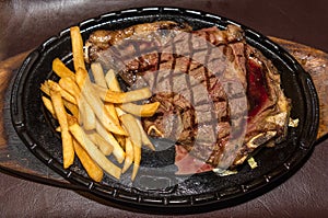 Premium American prime rib steak with french fries