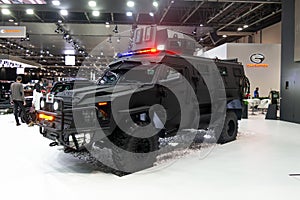 Premium armored vehicle displayed in a car show, safety and luxury automobile | INKAS