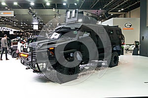 Premium armored vehicle displayed in a car show, safety and luxury automobile | INKAS