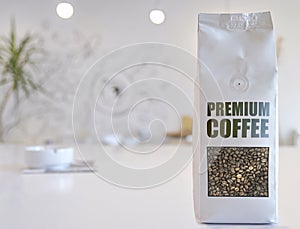 Premium coffee 250 grams commercial bag of coffee bean on a table in coffee shop