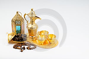 Premium dates, lantern and arabic coffee mug on white background.