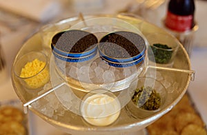 Premium french black beluga caviar in can VIP luxury food, appetizer ready to eat in Europe