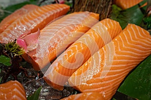 Premium fresh raw salmon sliced meat.