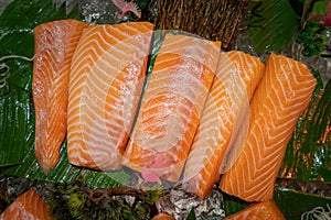 Premium fresh raw salmon sliced meat.