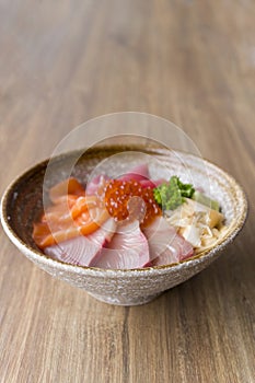 Fresh raw seafood mixed rice bowl Kaisen-don/ Japanese tasty food, Japanese Rice with sashimi of tuna, Maguro, Otoro,