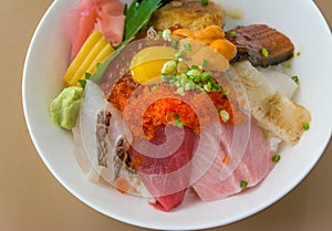 Premium fresh raw-seafood on rice (Kaisen Don) closeup.