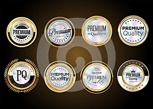 Premium quality gold and silver badges isolated on black background vector