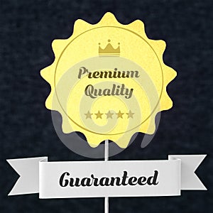 Premium quality guaranteed badge cut from cardboard