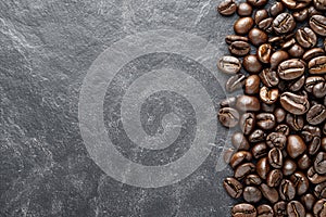 Premium roasted coffee beans on elegant black background ideal banner for coffee lovers and cafes