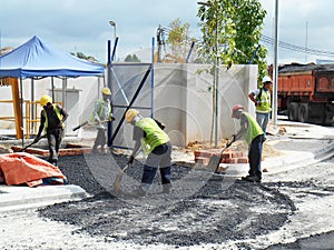 Premix work by construction workers.