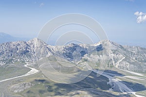 Prena and Camicia peaks at Campo Imperatore upland, aerial, Italy photo