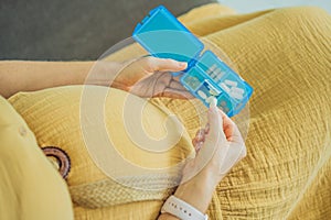 Prenatal Vitamins. Portrait Of Beautiful Smiling Pregnant Woman Holding Pill Box, Taking Supplements For Healthy