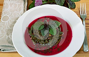 Prepaired braised amaranth - red spinach, in it`s own jucy sauce