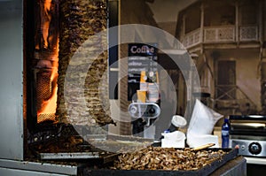 Preparation of arabic shaurma in Turkey. Tasty shawerma meat grilled on fire