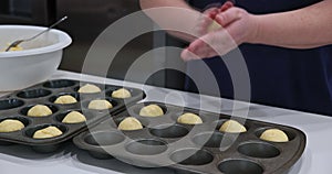Preparation for baking at baking tray brazilian a cheese buns