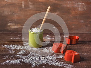 Preparation for baking holiday cookies, flour in a clay jar and molds