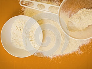 Preparation for baking, ingredients flour sifting.