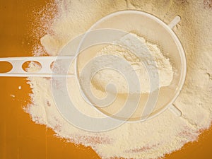 Preparation for baking, ingredients flour sifting.