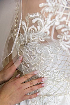 Preparation of bride dress for the wedding
