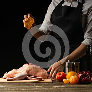 Preparation of the chef duck for Christmas, Thanksgiving, New Year`s Day. Recipe book menu, restaurant menu, instagram, hotel