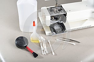 Preparation for cleaning sewing machine.