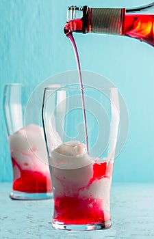 Preparation of cocktail Terremoto. Chilean traditional alcoholic drink Terrremoto. with pineapple ice cream, liquor photo