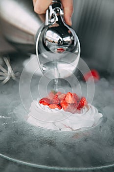 preparation of the dessert Pavlova