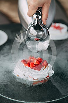 preparation of the dessert Pavlova