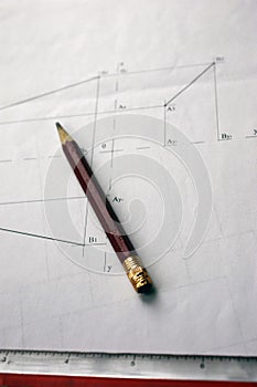 Preparation for drafting documents, drawings, tools and diagrams on the table.