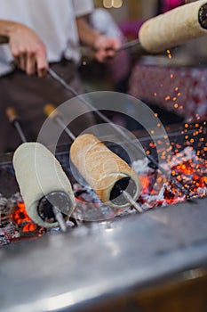 Preparation of the famous, traditional and delicious Hungarian Chimney Cake