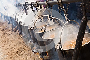 Preparation of food in open-fire boilers