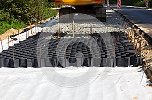 Preparation of the foundation for the road using geotextile and geogrid