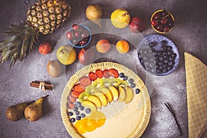 Preparation of Fruit Pie with Colorful Fruits and Fresh Dough Ready to Bake