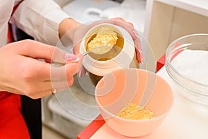 Preparation of a golden mask, a procedure at a beautician, facial care.