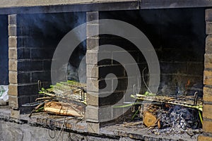 Preparation of grilled calÃÂ§ots, variety of tender onions. photo