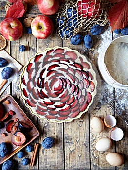 Preparation homemade plum cake zwetschgendatschi. Ingredients. Rustic style. Top View.