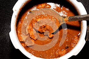 Preparation of Indian spicy Mutton curry